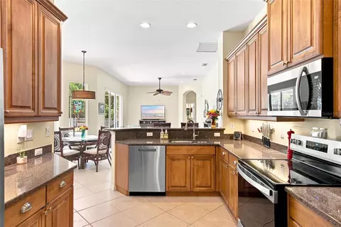 Kitchen - 11758 Hidden Forest Loop, Parrish, FL 34219 photo 6 of 9