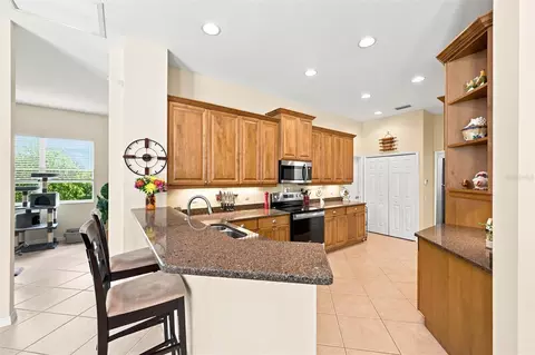 Kitchen - 11758 Hidden Forest Loop, Parrish, FL 34219 photo 3 of 9