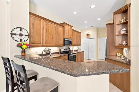 Kitchen - 11758 Hidden Forest Loop, Parrish, FL 34219 photo 8 of 9