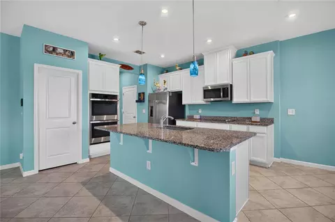 Kitchen - 8715 Sunshower Pl, Parrish, FL 34219 photo 2 of 6