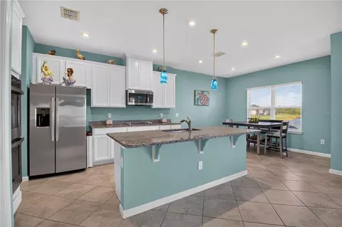 Kitchen - 8715 Sunshower Pl, Parrish, FL 34219 photo 1 of 6