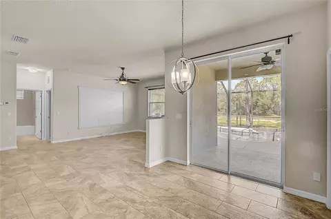 Living - 11691 Breadfruit Ln, Venice, FL 34292 photo 5 of 11