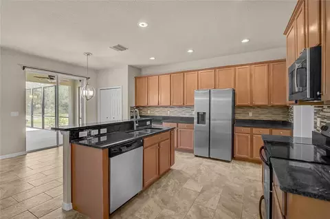 Kitchen - 11691 Breadfruit Ln, Venice, FL 34292 photo 1 of 4