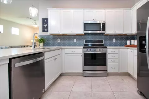Kitchen - 8427 Ocean Tides Cv, Parrish, FL 34219 photo 4 of 6