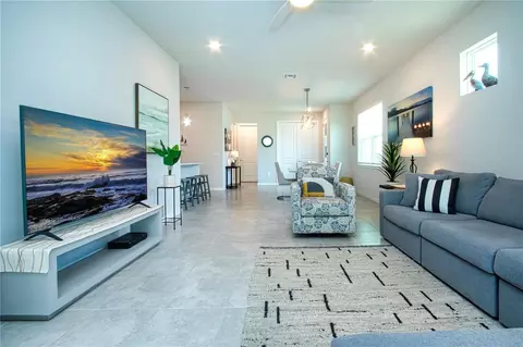 Living - 8427 Ocean Tides Cv, Parrish, FL 34219 photo 5 of 6