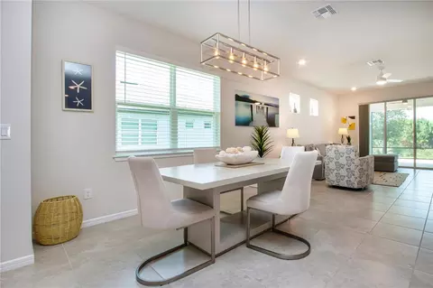 Dining - 8427 Ocean Tides Cv, Parrish, FL 34219 photo 3 of 5
