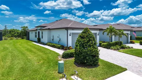 Exterior - 8427 Ocean Tides Cv, Parrish, FL 34219 photo 2 of 10