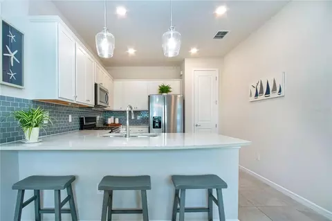 Kitchen - 8427 Ocean Tides Cv, Parrish, FL 34219 photo 2 of 6