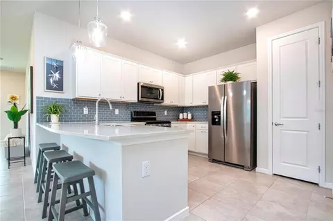 Kitchen - 8427 Ocean Tides Cv, Parrish, FL 34219 photo 1 of 6