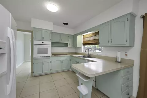 Kitchen - 2077 Druid Rd E, Clearwater, FL 33764 photo 2 of 6