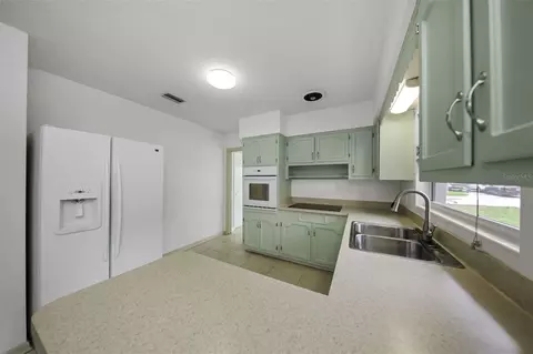 Kitchen - 2077 Druid Rd E, Clearwater, FL 33764 photo 3 of 6