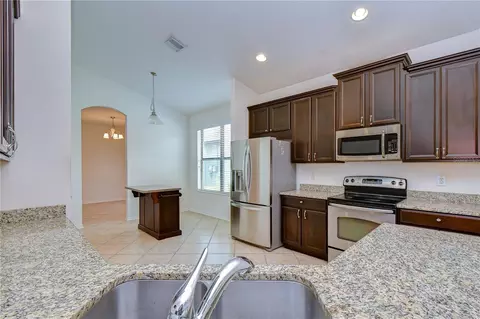 Kitchen - 8443 White Poplar Dr, Riverview, FL 33578 photo 9 of 9
