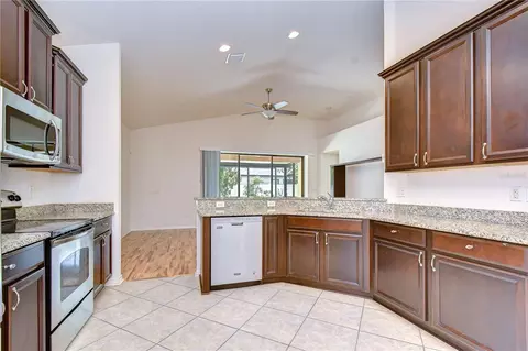 Kitchen - 8443 White Poplar Dr, Riverview, FL 33578 photo 6 of 9