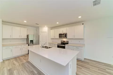 Kitchen - 12703 Blue Reflection Ave, Parrish, FL 34219 photo 2 of 7