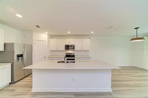 Kitchen - 12703 Blue Reflection Ave, Parrish, FL 34219 photo 3 of 7