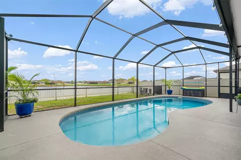 Exterior - 9823 Lemon Drop Loop, Ruskin, FL 33573 photo 4 of 13