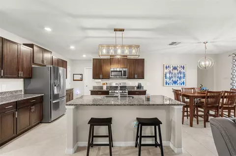 Kitchen - 9823 Lemon Drop Loop, Ruskin, FL 33573 photo 2 of 3