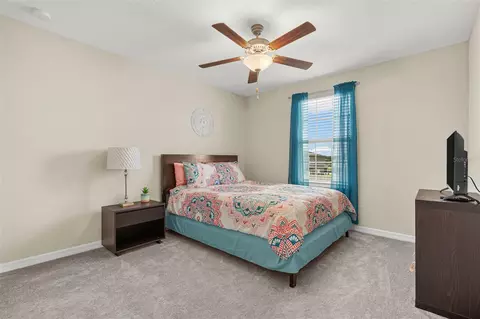 Bedroom - 9823 Lemon Drop Loop, Ruskin, FL 33573 photo 6 of 11