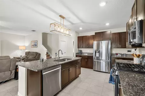 Kitchen - 9823 Lemon Drop Loop, Ruskin, FL 33573 photo 3 of 3