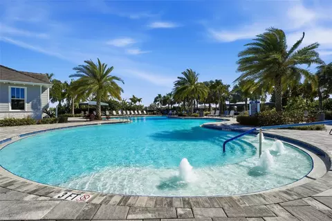Exterior - 14319 Skipping Stone Loop, Parrish, FL 34219 photo 9 of 14