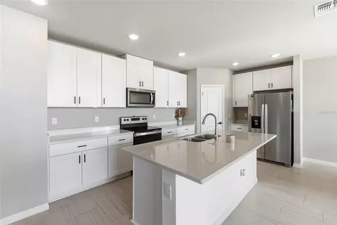 Kitchen - 7124 Amelia River Dr, Parrish, FL 34219 photo 2 of 3