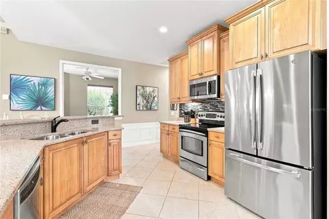 Kitchen - 11634 Old Cypress Cv, Parrish, FL 34219 photo 8 of 8