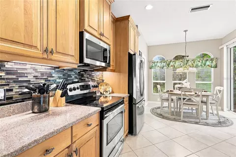 Kitchen - 11634 Old Cypress Cv, Parrish, FL 34219 photo 3 of 8
