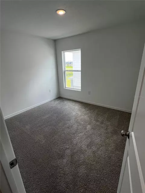 Bedroom - 12918 Red Deer Pl, Parrish, FL 34219 photo 5 of 6