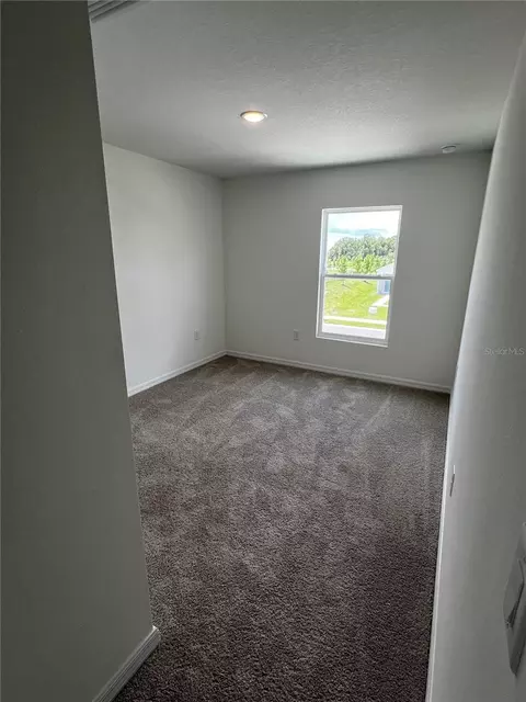 Bedroom - 12918 Red Deer Pl, Parrish, FL 34219 photo 4 of 6