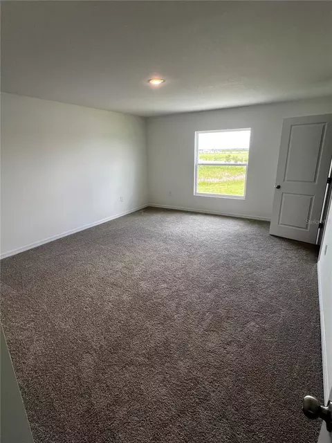 Bedroom - 12918 Red Deer Pl, Parrish, FL 34219 photo 3 of 6