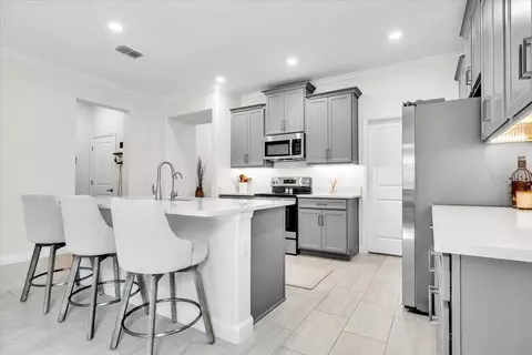 Kitchen - 14314 17th Ct E, Parrish, FL 34219 photo 3 of 13