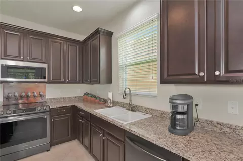 Kitchen - 7711 110th Ave E, Parrish, FL 34219 photo 4 of 8