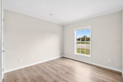 Bedroom - 16918 NW 264th St, Okeechobee, FL 34972 photo 8 of 10