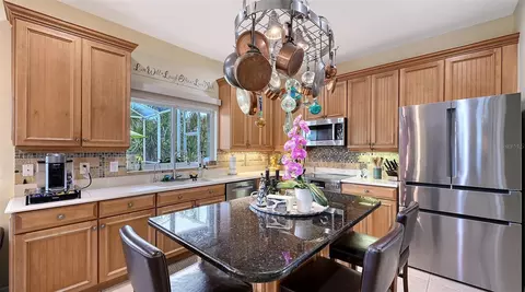 Kitchen - 907 Eagle Isle Ct, Osprey, FL 34229 photo 4 of 10