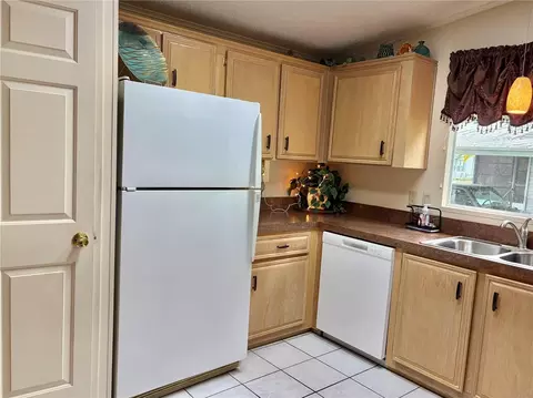 Kitchen - 5707 45th St E #64, Bradenton, FL 34203 photo 3 of 4