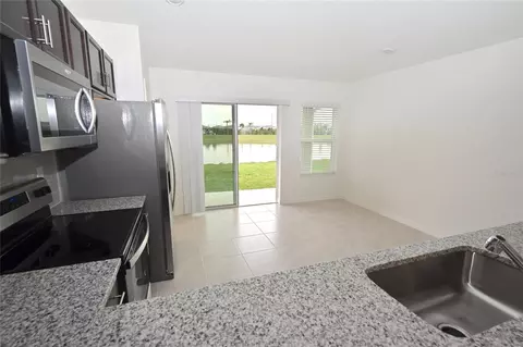 Kitchen - 9532 Sandy Bluffs Cir, Parrish, FL 34219 photo 7 of 7