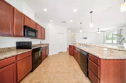 Kitchen - 115 64th Ave E, Bradenton, FL 34203 photo 2 of 9