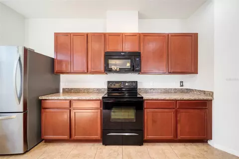 Kitchen - 115 64th Ave E, Bradenton, FL 34203 photo 8 of 9