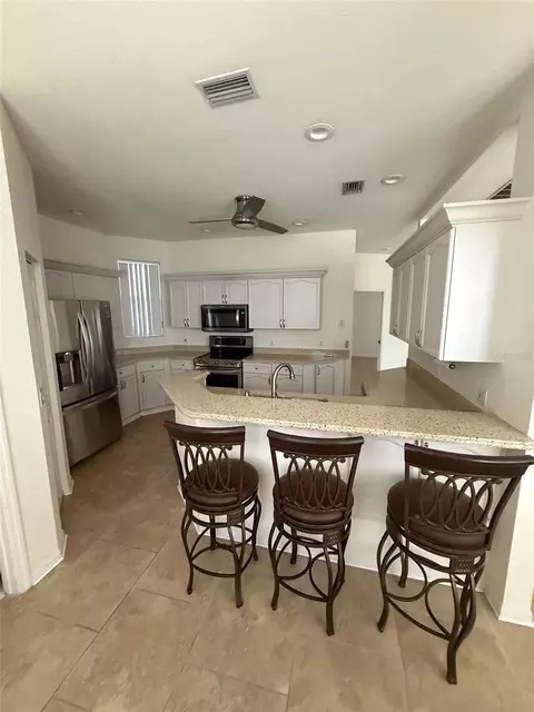 Kitchen - 4398 Summertree Rd, Venice, FL 34293 photo 1 of 2