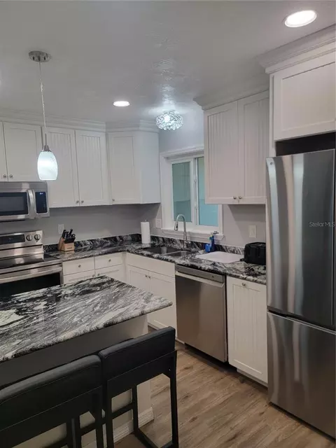 Kitchen - 516 1st Ave E, Bradenton, FL 34208 photo 4 of 6