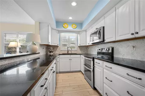 Kitchen - 2426 Wilderness Blvd W, Parrish, FL 34219 photo 3 of 4