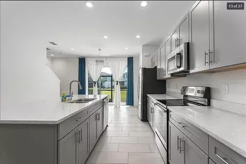 Kitchen - 11619 Bluestone Ct, Parrish, FL 34219 photo 2 of 3