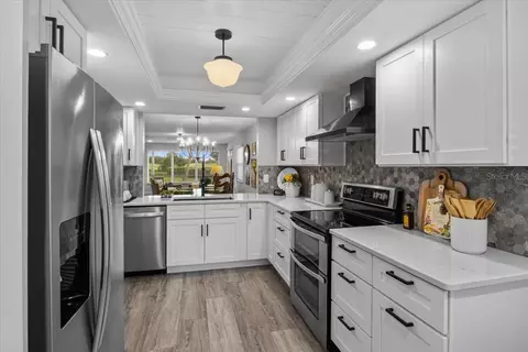 Kitchen - 2420 Wilderness Blvd W, Parrish, FL 34219 photo 3 of 6