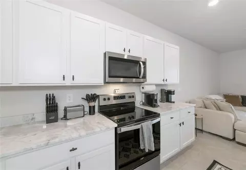 Kitchen - 17645 Crescent Moon Loop, Bradenton, FL 34211 photo 6 of 7