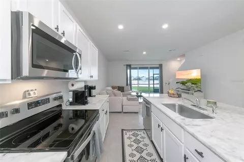 Kitchen - 17645 Crescent Moon Loop, Bradenton, FL 34211 photo 5 of 7