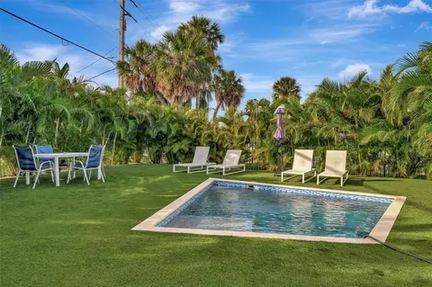 Exterior - 303 58th St, Holmes Beach, FL 34217 photo 11 of 20