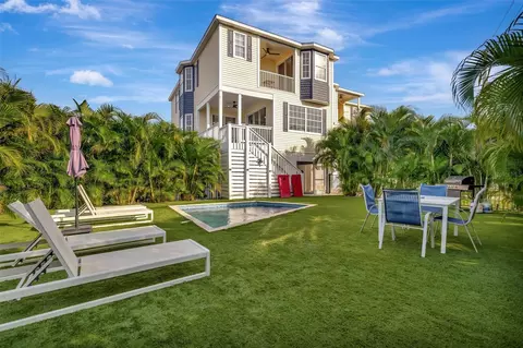 Exterior - 303 58th St, Holmes Beach, FL 34217 photo 1 of 20