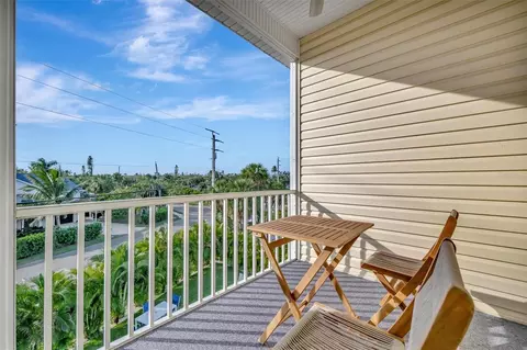 Exterior - 303 58th St, Holmes Beach, FL 34217 photo 6 of 20