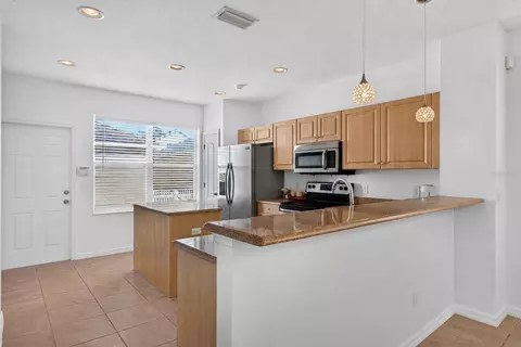 Kitchen - 4904 Forest Creek Trl, Parrish, FL 34219 photo 2 of 3