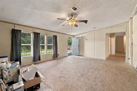 Living - 254 SE 7th Ave, Interlachen, FL 32148 photo 1 of 3